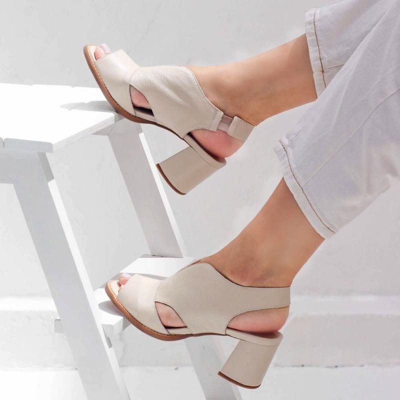 https://cdn.shopify.com/s/files/1/0998/9200/3147/files/womens-leather-sandals-with-heel-comfort-footbed-selina-beige-2_5-state_of_style.jpg?v=1766840310