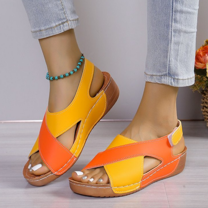 https://cdn.shopify.com/s/files/1/0998/9200/3147/files/yola-comfortable-sandals-orange-4_5-state_of_style-3.png?v=1766840319