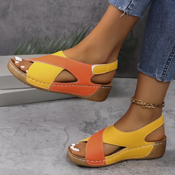 https://cdn.shopify.com/s/files/1/0998/9200/3147/files/yola-comfortable-sandals-orange-4_5-state_of_style-7.png?v=1766840319