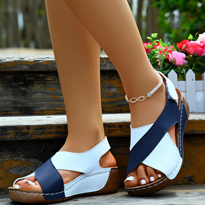 https://cdn.shopify.com/s/files/1/0998/9200/3147/files/yola-comfortable-sandals-orange-4_5-state_of_style.png?v=1766840319